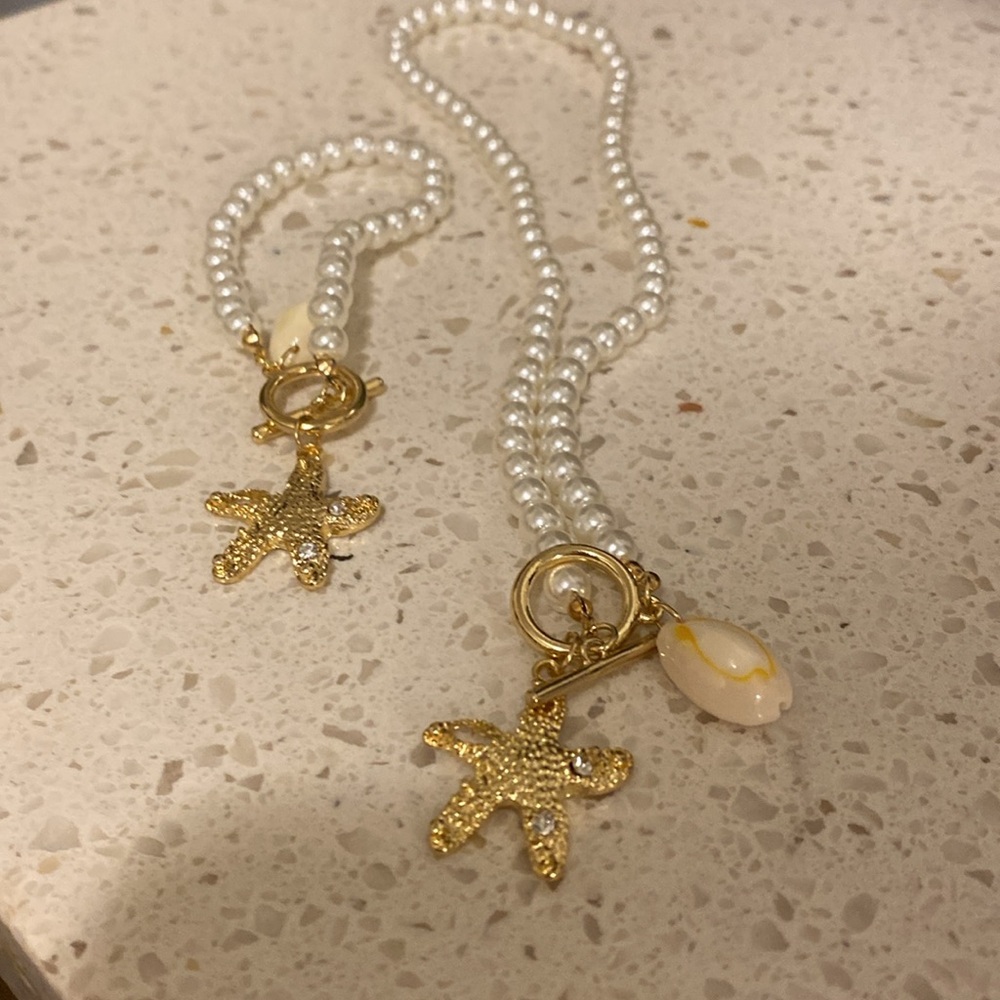 Pearl necklace, matching bracelet with little gold starfish and seashell